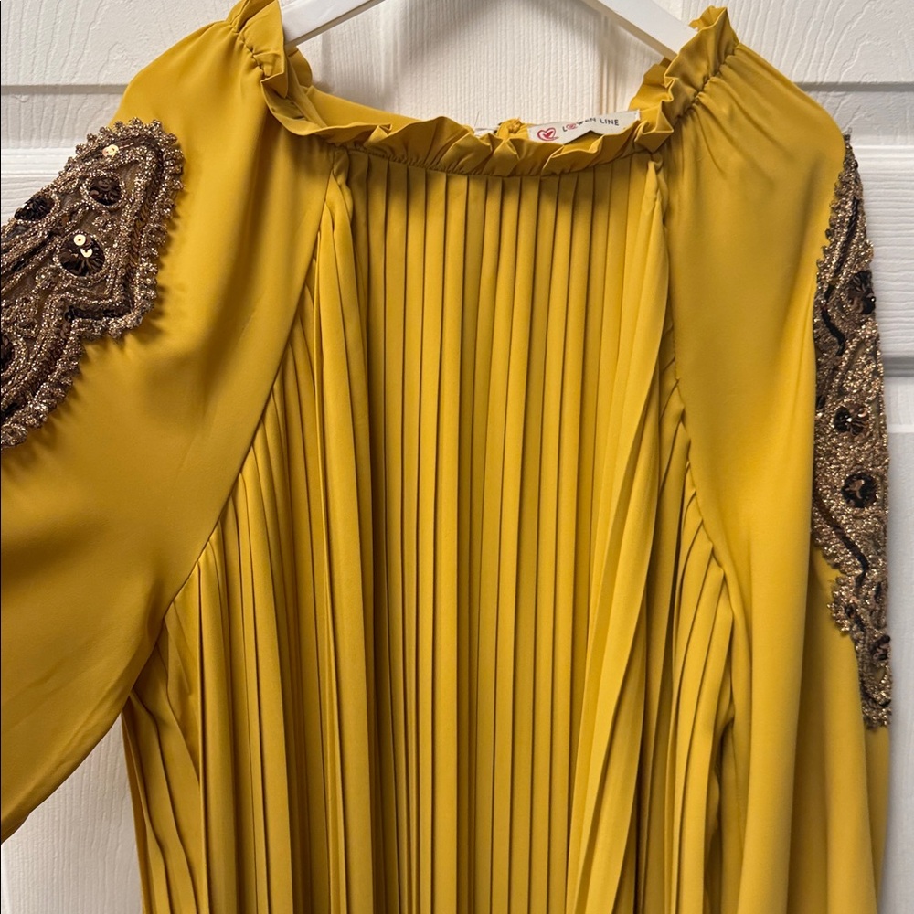 Chic Yellow Dress with Embellished Sleeves